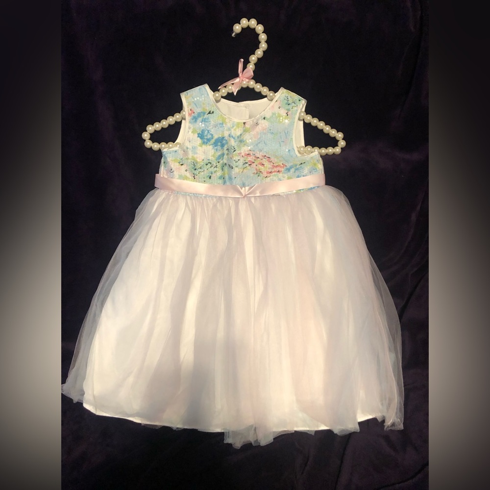Beautiful white, pink, blue and green tulle dress.
